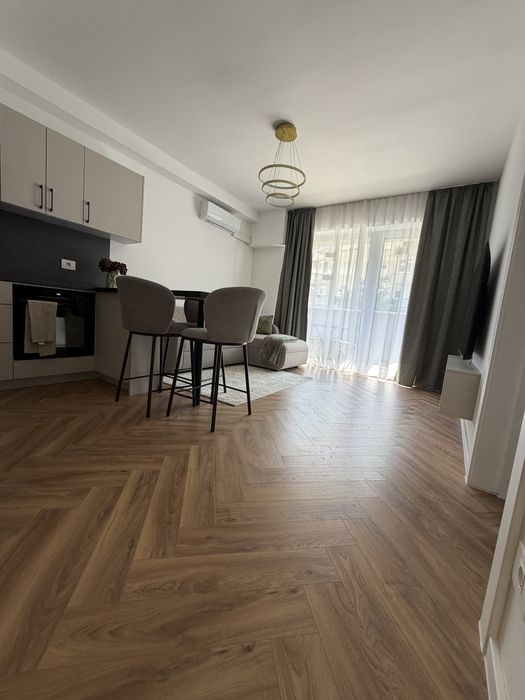 Apartament 2 camere, prima închiriere, parcare privată, complet mobilat și utilat – 450€/lună