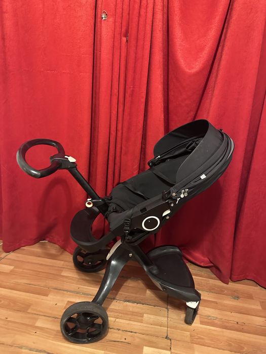 Carucior Stokke stare excelenta umbrela si geanta negru
