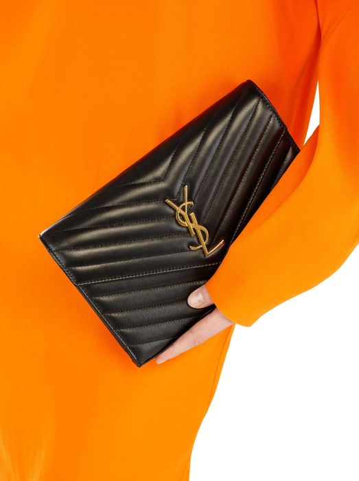 Saint Laurent черный кожаный клатч Cassandre