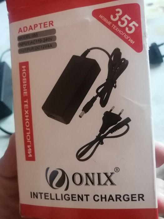 Адаптер зарядка.