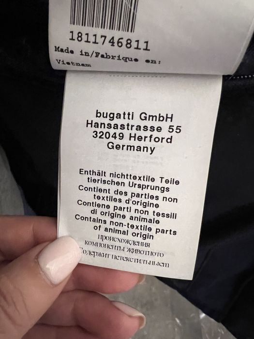 Продам пуховик мужской bugatti