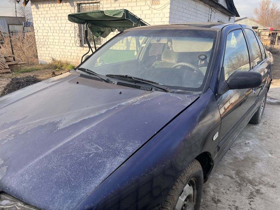 Ниссан премера..