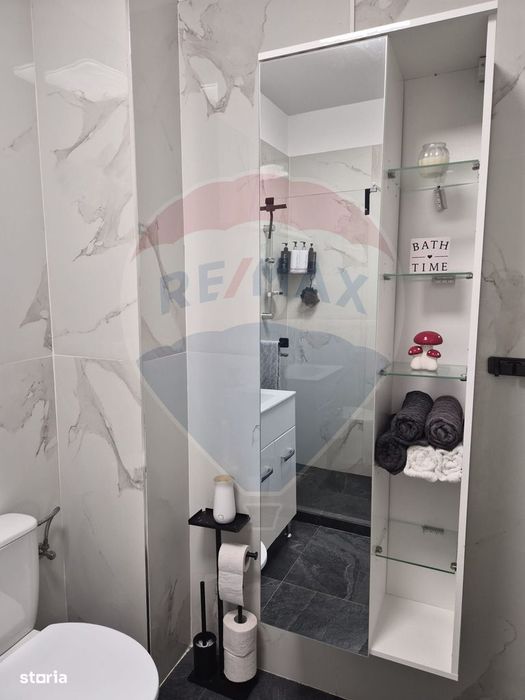 Apartament luminos cu 2 camere, mobilat complet si cu loc de parcare