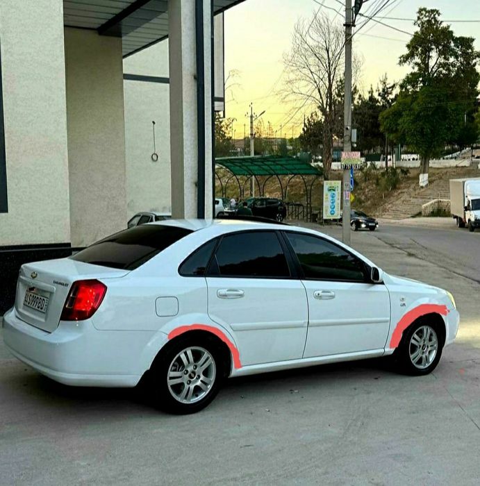Ласетти 1,6 автомат.2013. Бензин.