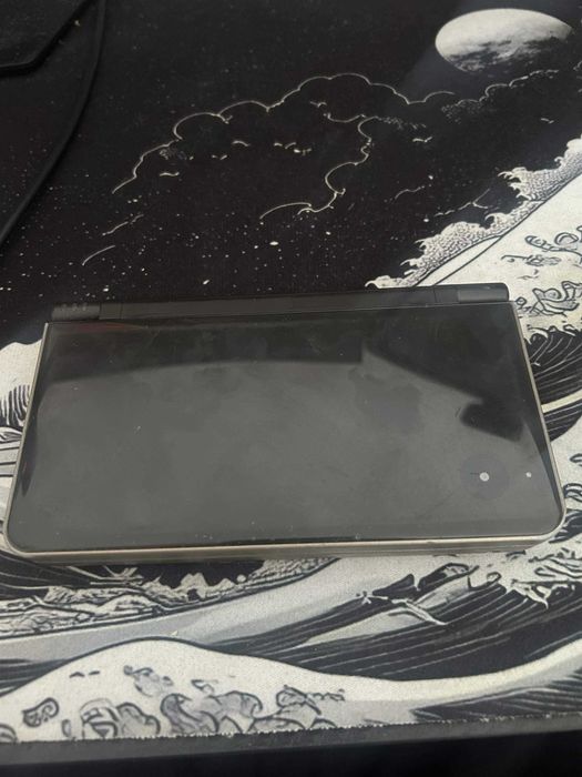 Nintendo DSi XL Bronz with charger and pen