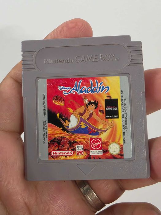 Nintendo Gameboy Poket transparent editie limitata si joc Aladdin