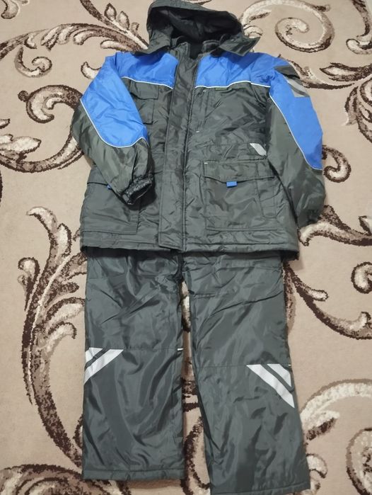 Продам новые комбинезоны зимние