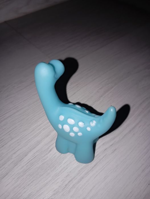 Игрушка динозавр синий