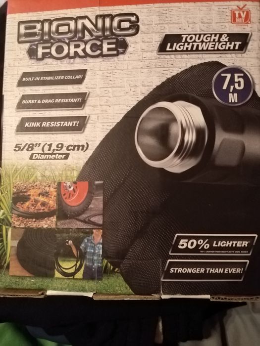 Чисто нов градински маркуч.