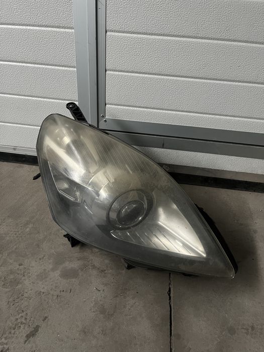 Far / faruri stânga dreapta Opel Zafira B cu xenon