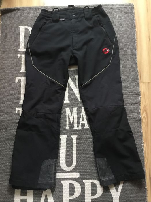 Geci pantaloni Mammut jack wolfskin si alte marci