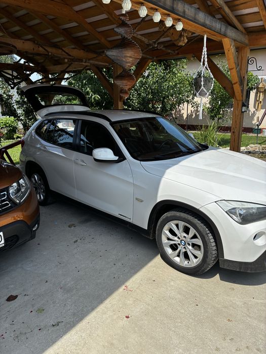 BMW X1 2010 — imagine 1