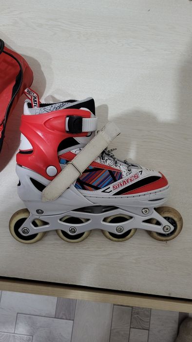 Роликовые коньки