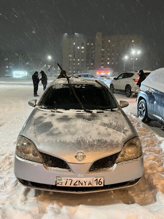 Ниссан примера 2003