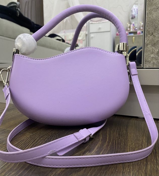 Kunlik tutish uchun yangi holatdagi sumka.