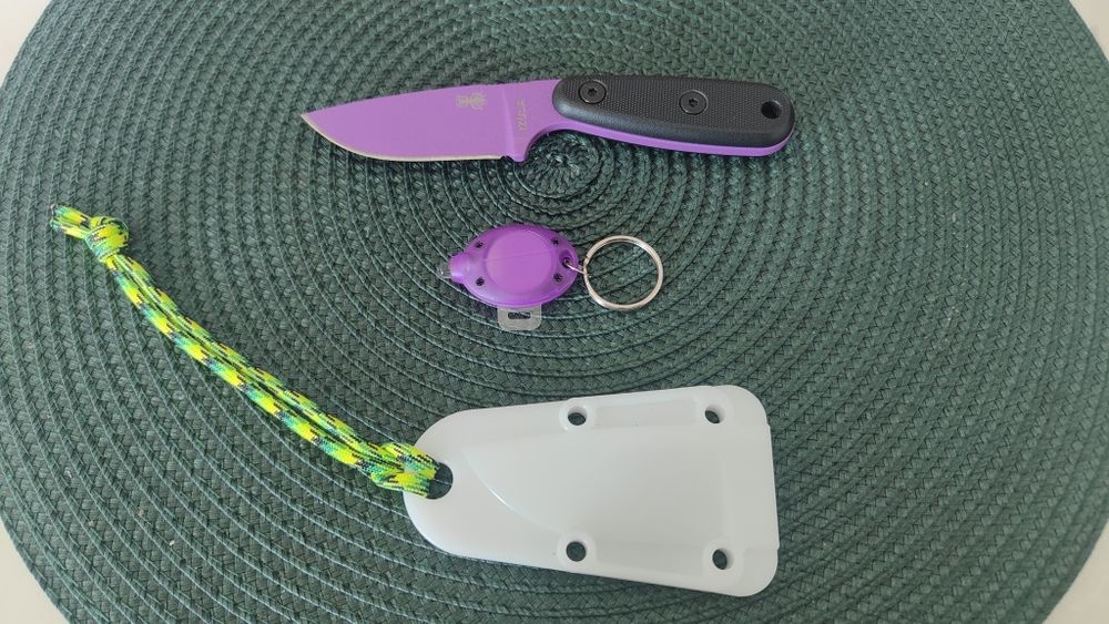 Esee Izula EDC knife neck