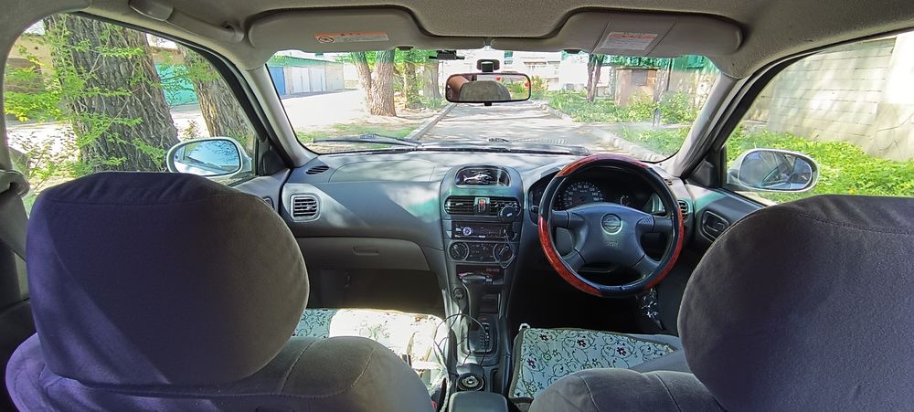 Автомобиль Nissan b15