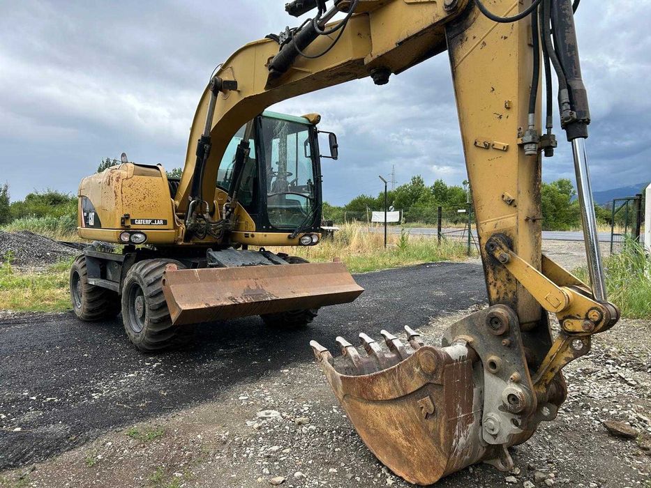 Excavator pe roti CAT M313D