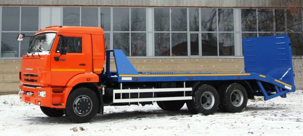 Услуги Эвакуватор перевозка кара экскаватор каток трал  трейлер