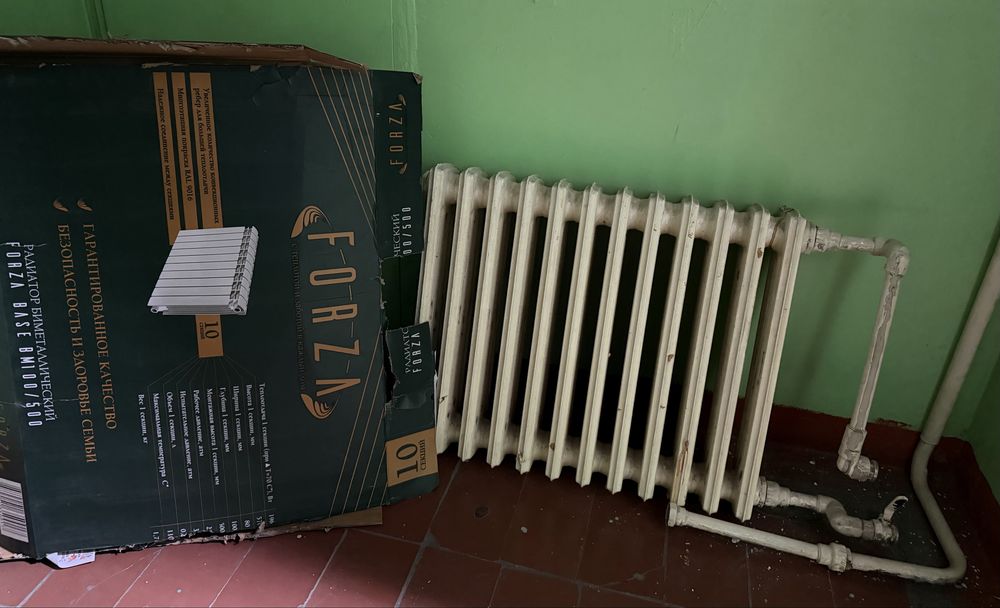 продам радиатор б/у чугунный