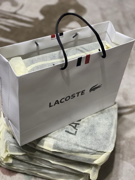 Барсетки новые Lacoste