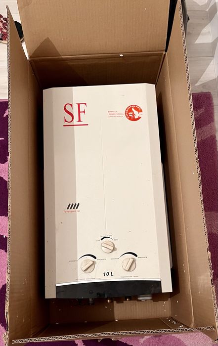 Газовая колонка марка SF бу.