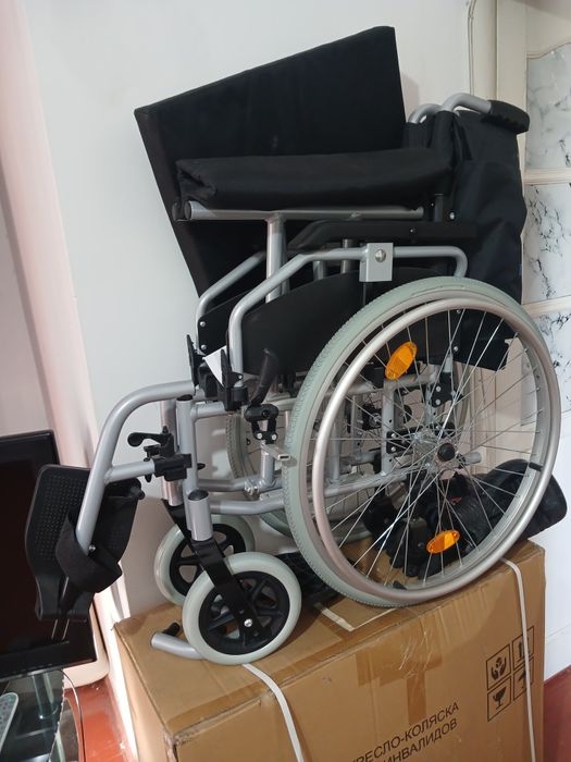 Инвалидная коляска