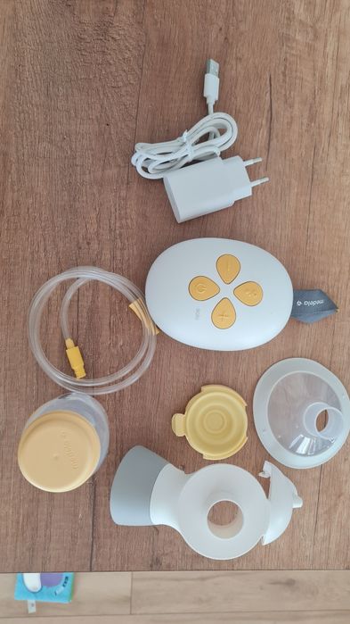 Електрическа помпа за кърма Medela + биберон Калма + пликове за кърма
