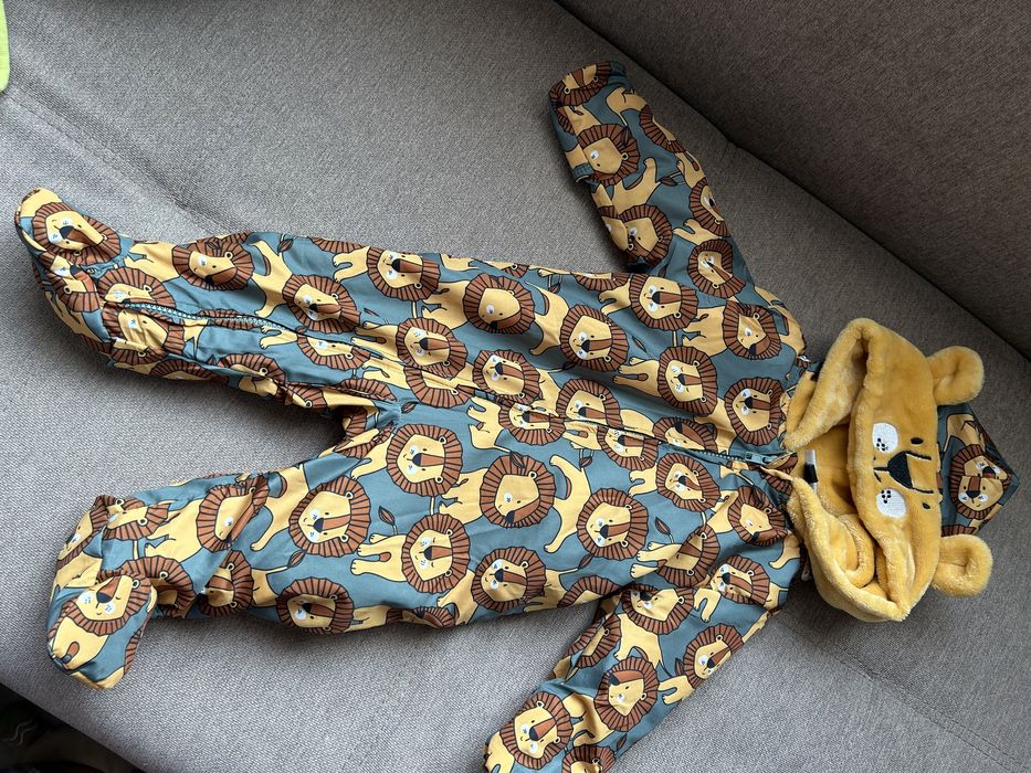 Бебешки космонавт с лъвчета (6–9 месеца)