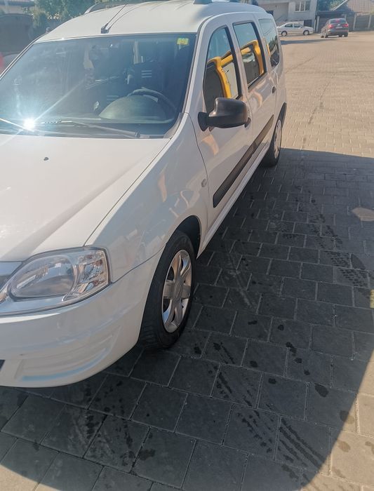 Vând Logan MCV,an 2012,motor 1.6 MPI