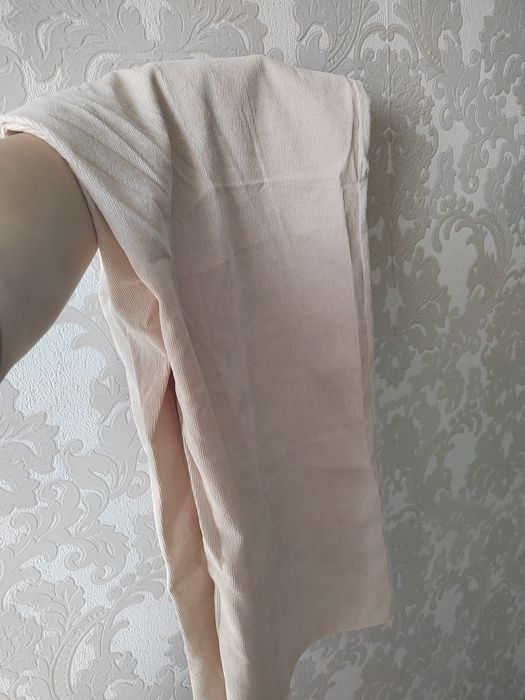 Продам брюки новые 52р молочные