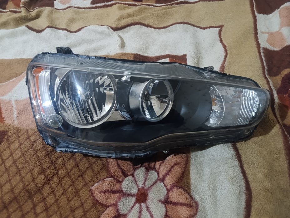 Фара на Мицубиси лансер х