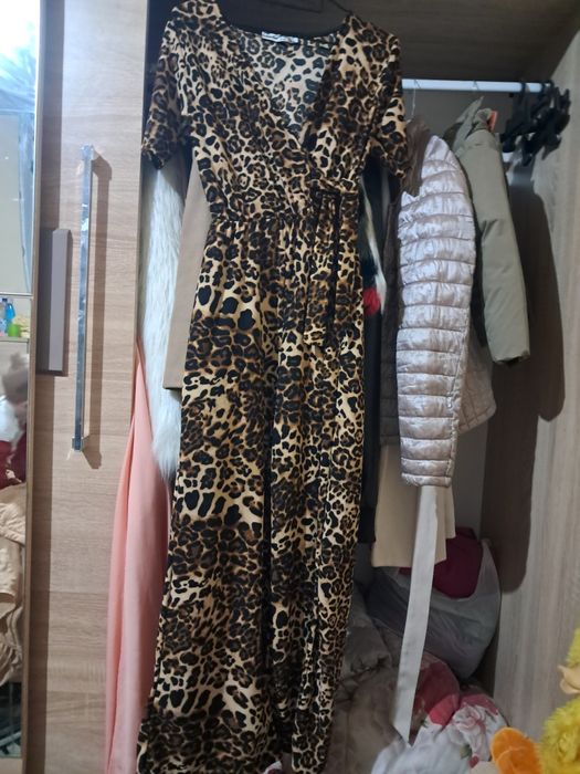 Salopetă cu maneca scurtă purtată o singura dată