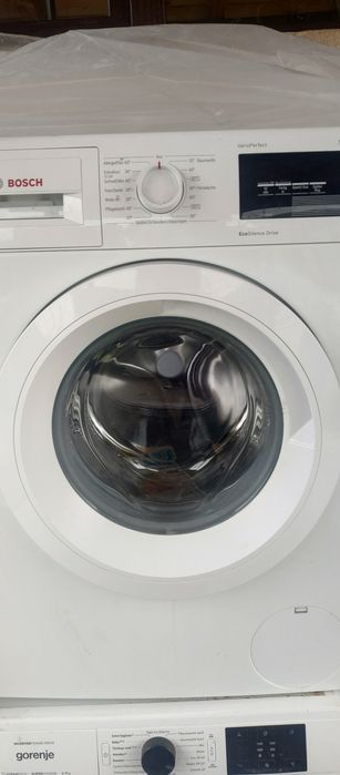 Mașina de spălat rufe Bosch  că noua