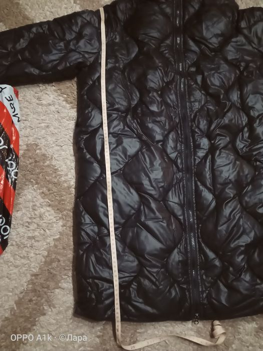 Продам пуховик новый,48-50