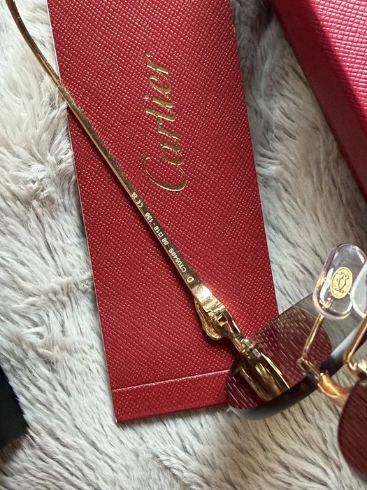 Ochelari de soare Cartier – model rotund fără ramă, auriu, unisex
