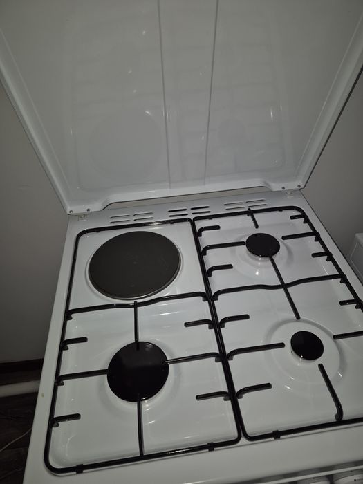 Газ плита новый.