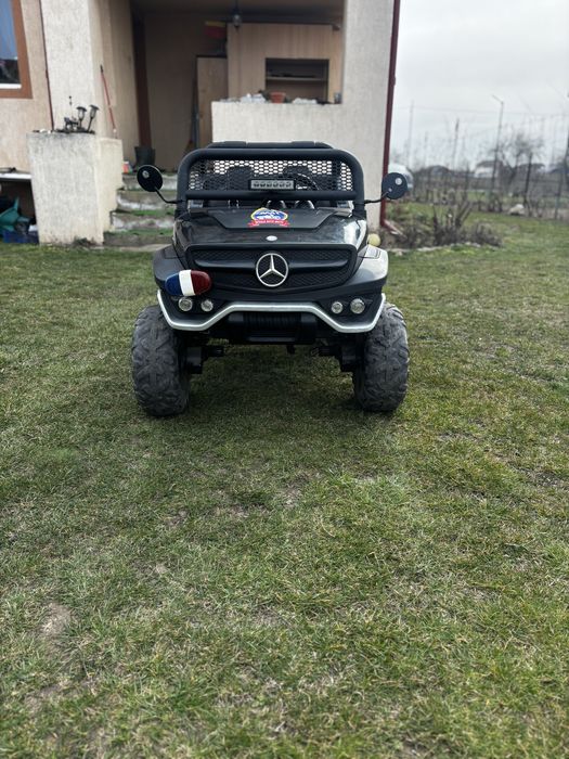 Masinuța 4x4 mercedes unimog 2 locuri