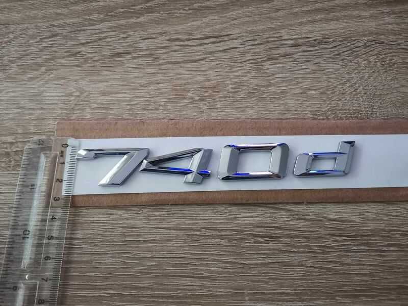 сребриста емблема BMW 740d
