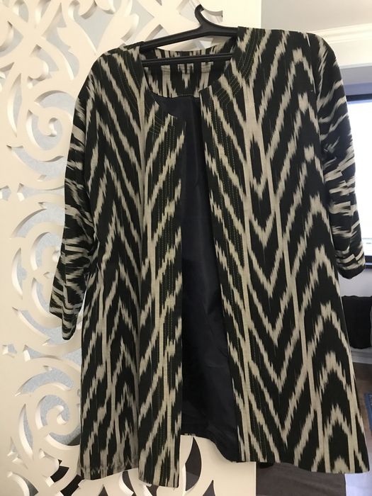 платья, костюмы продам