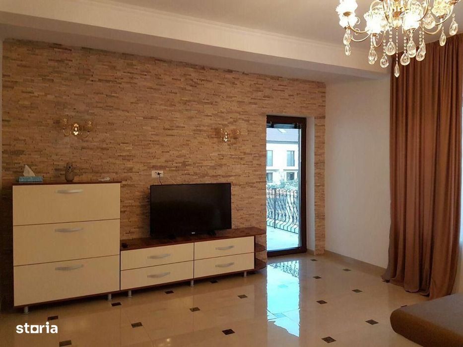 Casa individuala cu 5 camere, demisol cu garaj.