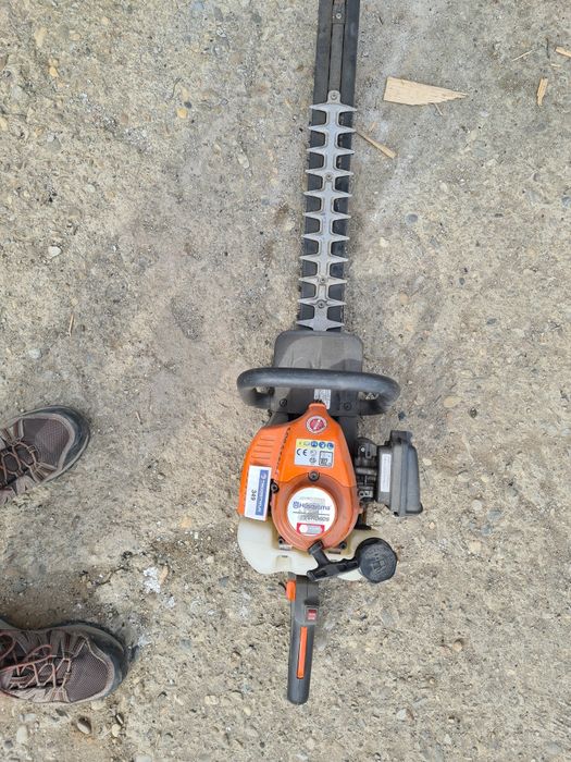 Trimer gard viu utilizat sau nou