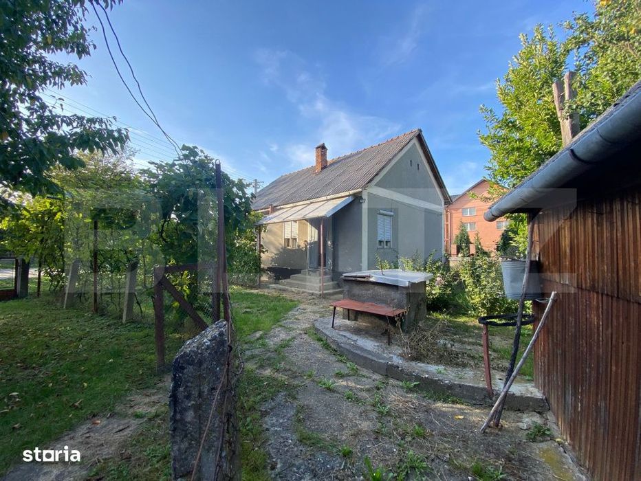 Casa cu teren 10 ari, 2 anexe si dublu front stradal – Beclean