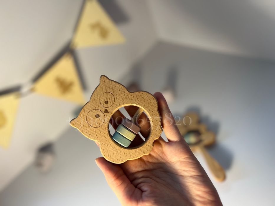 Деревянная развивающая игрушка погремушка