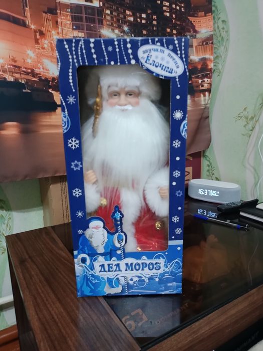 Продается новое платье и дед мороз поющий,