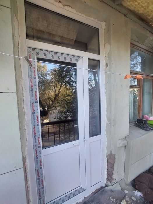 Пластиковые окна двери балконы