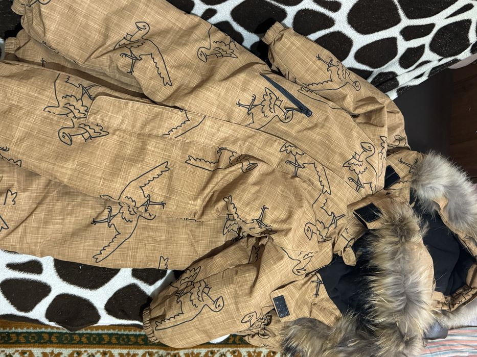 Продам комбинезоны зимние