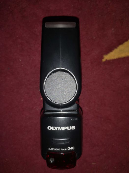 Bliț Nikon și Olympus