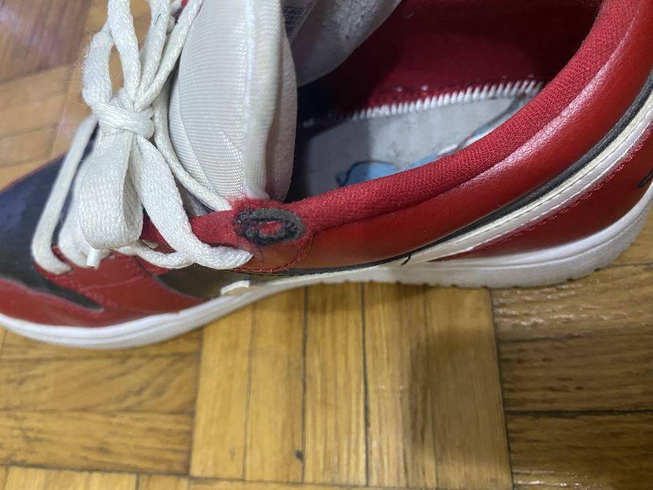 Jordan 1 low roșu/negru/alb