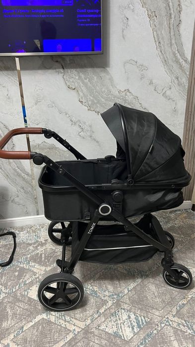 Коляска от фирмы Tomix 2в1